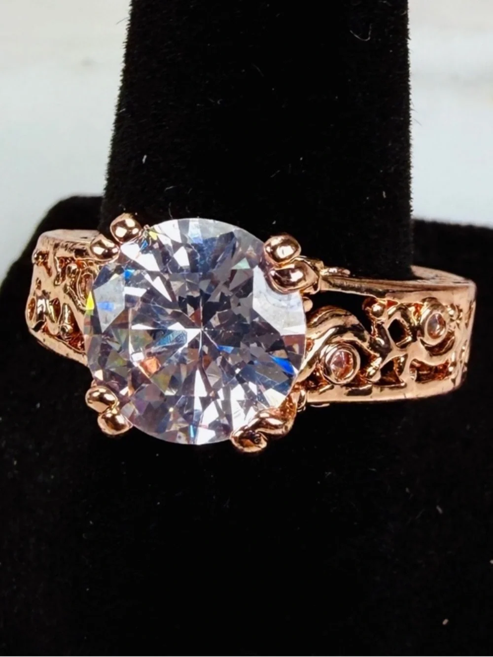 Beautiful rose goldtone, clear bling size 8 costume ring